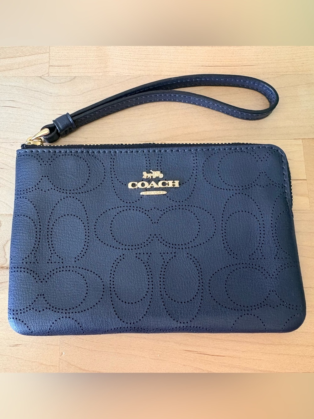 Coach Navy Perforated Signature Wristlet with Gold Logo